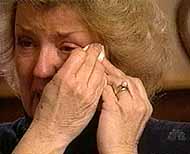 Juanita Broaddrick wipes a tear from her eye during her January 1999 interview on 