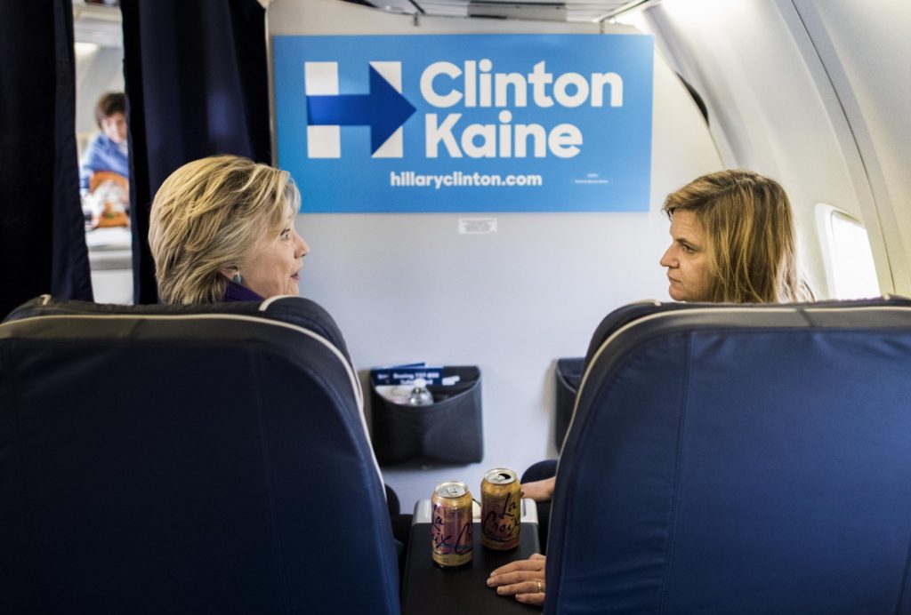 Clinton speaks with communications director Jennifer Palmieri aboard the campaign plane. (Melina Mara/The Washington Post)